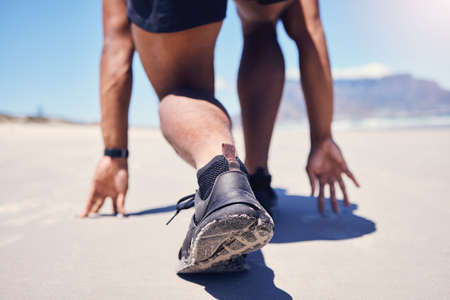 Get ready for a more active you. Rearview shot of a man training on the beach.