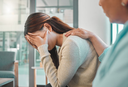 Its okay not to be okay. a young woman looking sad during a consultation with her psychologist.