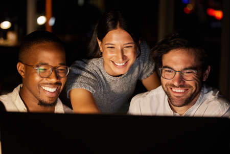 They found the solution just in time. a group of businesspeople working together on a computer in an...