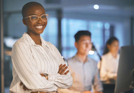 Putting in the work for my success. a young businesswoman standing with her arms crossed in a modern...