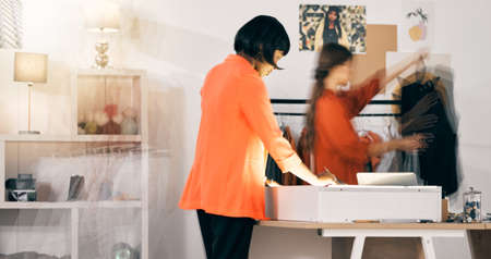 Passionate about the perfect fit. two businesswomen working on designs at a workshop.