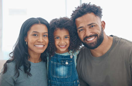 Time together as a family is a gift. a happy family relaxing together at home.