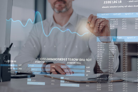 Tracking the stock market. an unrecognisable businessman sitting alone in his office and following...