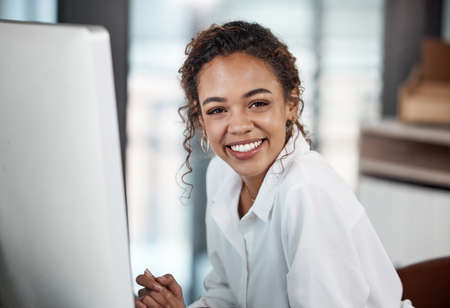 Success is what Im chasing. Cropped portrait of an attractive young businesswoman working at her...