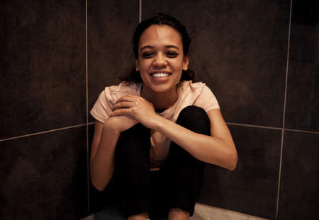 a young female having a mental breakdown at home.の写真素材