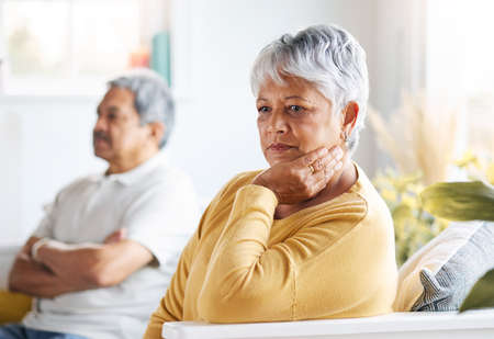 Weve been through so much already. a senior couple arguing at home.