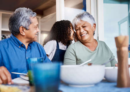 a happy family having lunch together at home.
