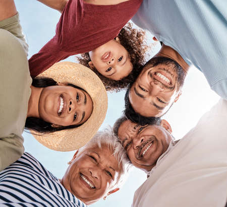 Its always fun when the family gets together. a multi-generational family spending the day at the beach.の写真素材