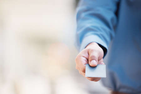 Companys treat. a businessman using a credit card to make payments.の写真素材