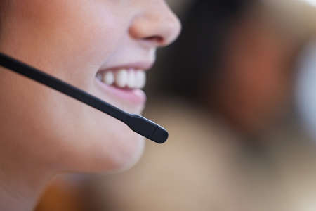 Well give you a timely response. Closeup shot of an unrecognisable businesswoman wearing a headset...
