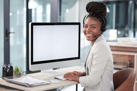 Youll find lots more info on our website. Portrait of a young call centre agent working on a...