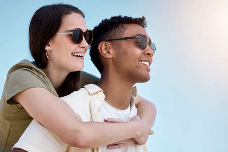 Enjoying a day with my favourite person. a young couple enjoying a day at the beach.の写真素材