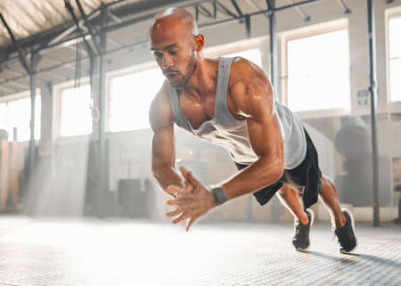 He caught some real air. a young man completing a push up.