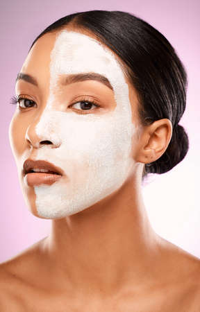 Bring out the beauty in you. Studio shot of an attractive young woman having a facial against a pink...