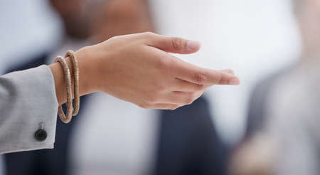Does that make sense to everyone. an unrecognisable businesswoman explaining to a group of...