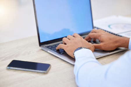 Making this assignment mine. a businessman working on his laptop.