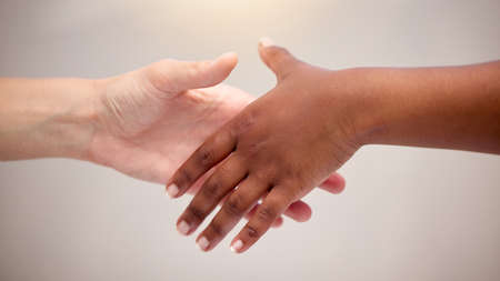 Reaching out to loved ones. two people reaching for one another.
