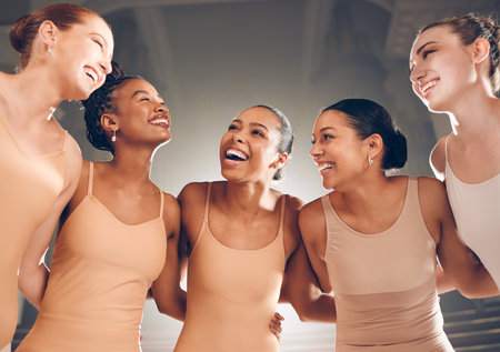 Find the way to be yourself in your art. a group of ballet dancers laughing together on a stage.の写真素材