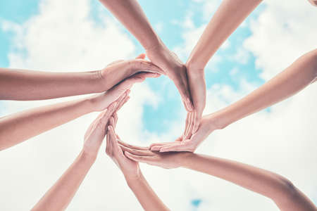 Weve got each others backs always. Low angle show of an unrecognisable group of women standing...