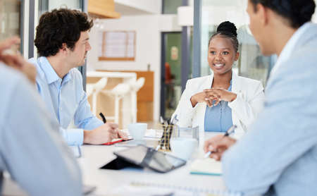 Online marketing is the best way forward. businesspeople having a meeting in a boardroom at work.