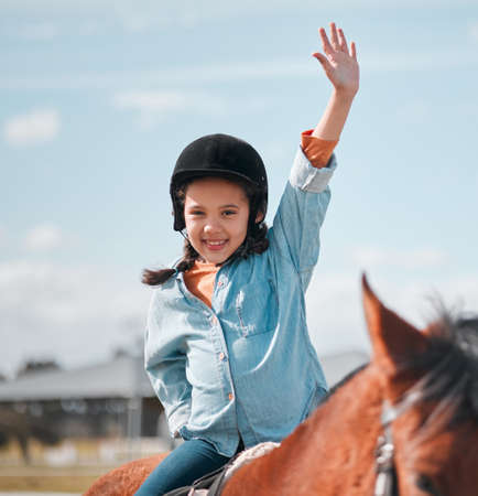 Who loves horseback riding Me. an adorable little girl riding a horse.