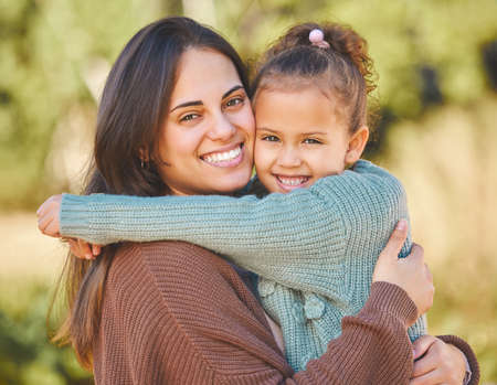 Ill always want to hold you. a young mother and daughter hugging.の写真素材