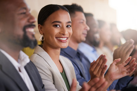 Im enjoying every minute of this. Cropped portrait of an attractive young businesswoman applauding...