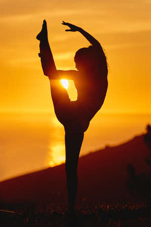 The perfect way to end off the day. Full length shot of an unrecognizable and athletic young woman...