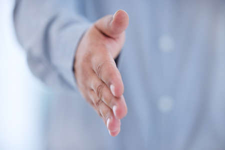 Wed be happy to have you on the team. an unrecognizable businessman standing alone in the office and...