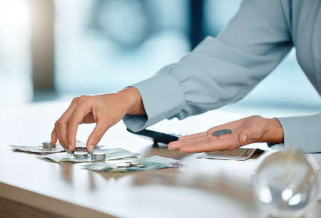 Accountants hands doing accounting and saving money to create a budget for a wise financial...