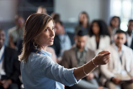 I think I made it. a businesswoman delivering a presentation at a conference.