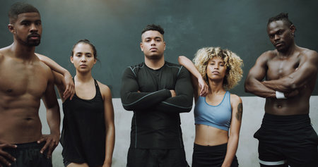 Our squad are the strongest out there. Portrait of a group of sporty young people standing together...