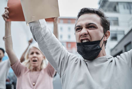 Well never allow this. a young man marching at a vaccination protest.の写真素材