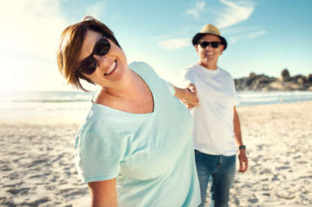 Theres nothing like a day at the beach. a mature couple spending the day at the beach.