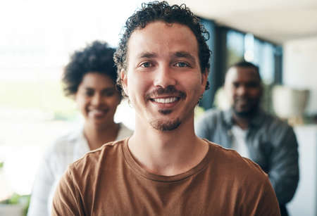 You are the ceo of your own life. a group of businesspeople smiling in an office.