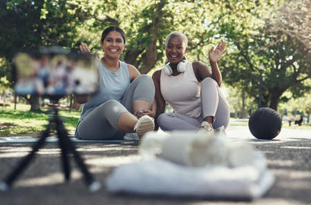 I hope our audience like this video. two female friends taking a break to livestream their workout.