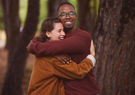 Hanging out in nature brings couples closer together. an affectionate couple spending the day outdoors.の写真素材