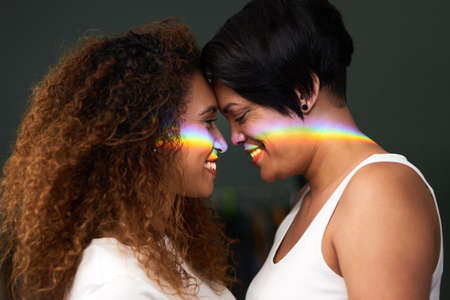 Your love, like a rainbow came after the storm. an affectionate couple standing together at home...