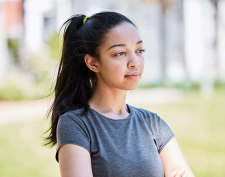 Maybe I should switch up my running routine. a young woman looking thoughtful during her workout at...