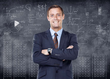 Business man working in finance and standing with arms crossed looking proud, happy and smiling in...