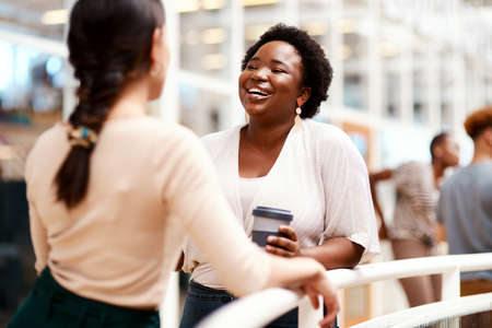 Networking will help improve your social skills. a young businesswoman having a discussion with a...