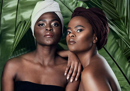 Confident in our beauty and heritage. Studio portrait of two beautiful young women posing in front...