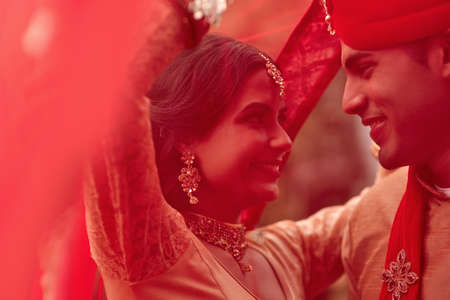 This is the most special day of our lives. a young hindu couple on their wedding day.の写真素材