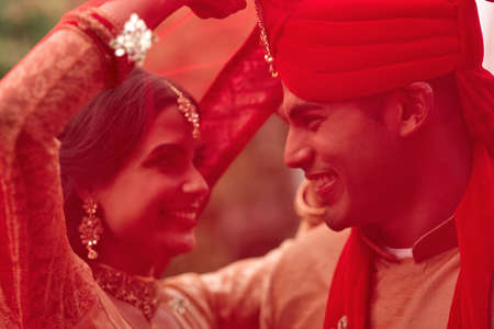 Love with everything youve got. a young hindu couple on their wedding day.