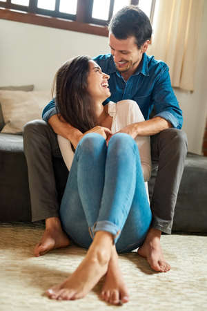 Each others company is all we really need. Full length shot of an affectionate young couple spending...