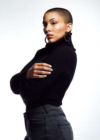Embrace yourself and accept all your flaws. Studio shot of an attractive young woman posing with her arms folded against a grey background.の写真素材