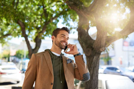 Im glad you called... a handsome young man making a phonecall during his morning commute.