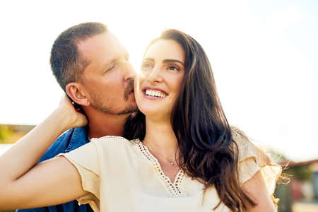 Our together is sure to last forever. a happy couple bonding together outdoors.の写真素材