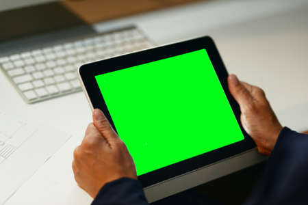 Its the best app to help simplify business. Closeup shot of an unrecognizable businesswoman using a...