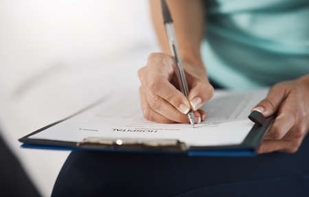 She never misses a detail. an unrecognizable female physiotherapist working in her office.